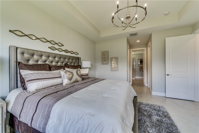 bedroom with an inviting chandelier