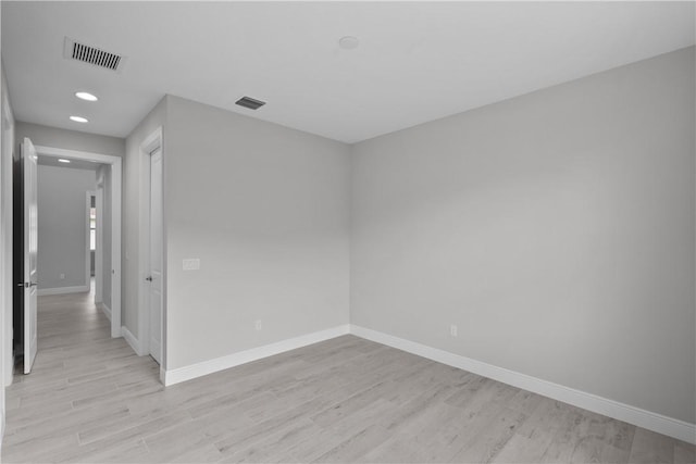 empty room featuring light hardwood / wood-style floors