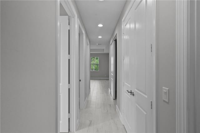 hall featuring light hardwood / wood-style flooring