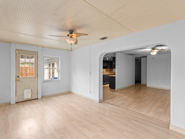 unfurnished room featuring ceiling fan and light wood-type flooring