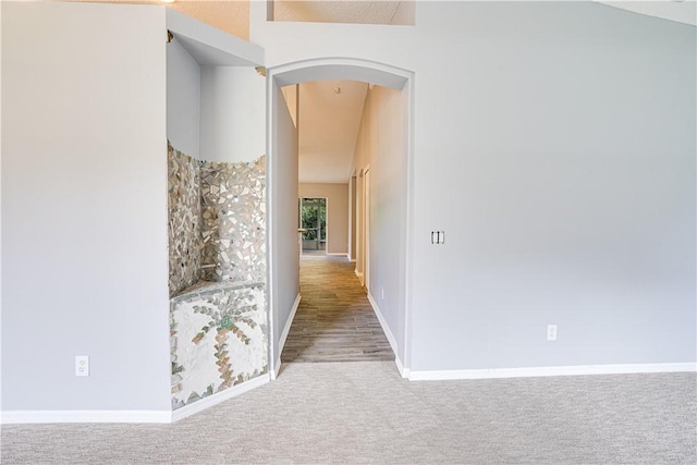 hallway featuring carpet flooring