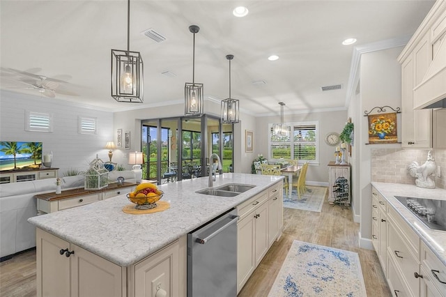 kitchen featuring visible vents, dishwasher, ornamental molding, black electric stovetop, and a sink