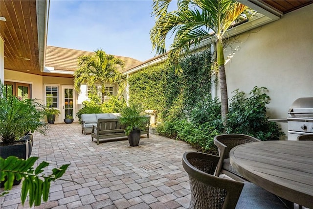 view of patio featuring an outdoor living space and area for grilling