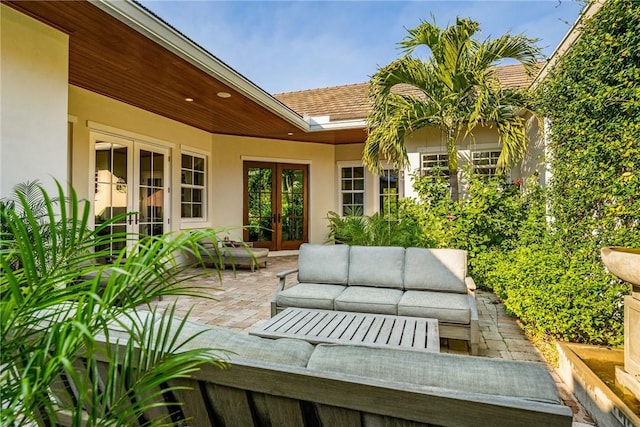 view of patio with outdoor lounge area and french doors