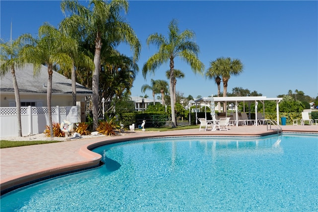 view of swimming pool featuring a patio area