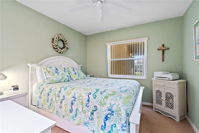 bedroom with carpet flooring and ceiling fan