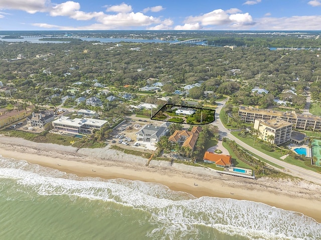 bird's eye view with a view of the beach and a water view