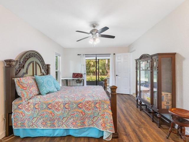 bedroom featuring access to exterior, dark hardwood / wood-style flooring, and ceiling fan