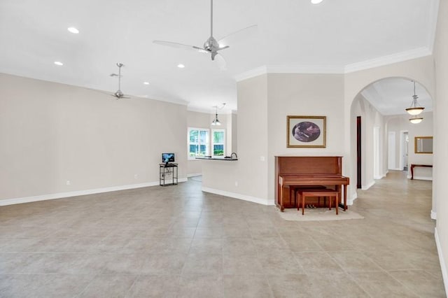 unfurnished living room with crown molding, baseboards, ceiling fan, recessed lighting, and arched walkways