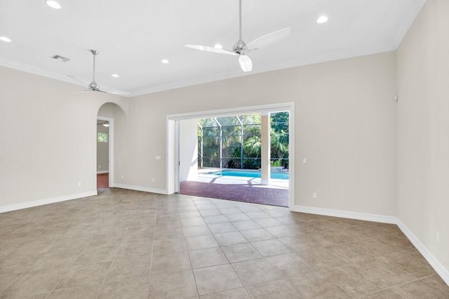 unfurnished room featuring visible vents, baseboards, and ceiling fan