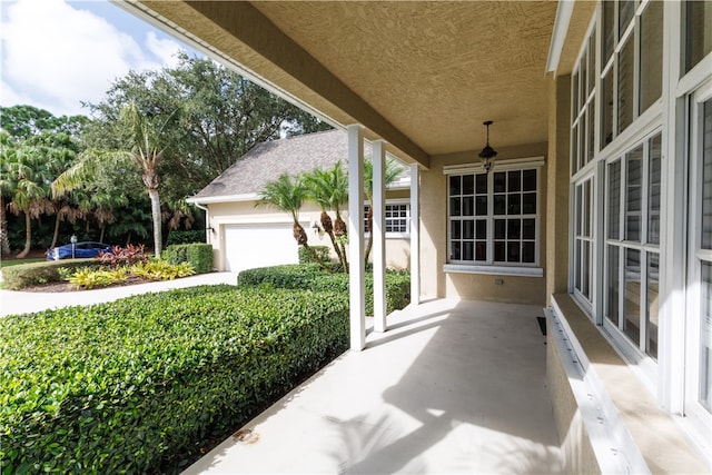 view of patio with a garage