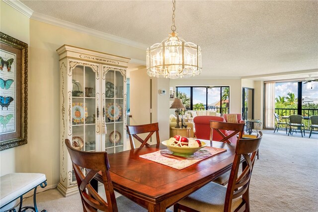 carpeted dining area featuring a textured ceiling, a notable chandelier, and crown molding