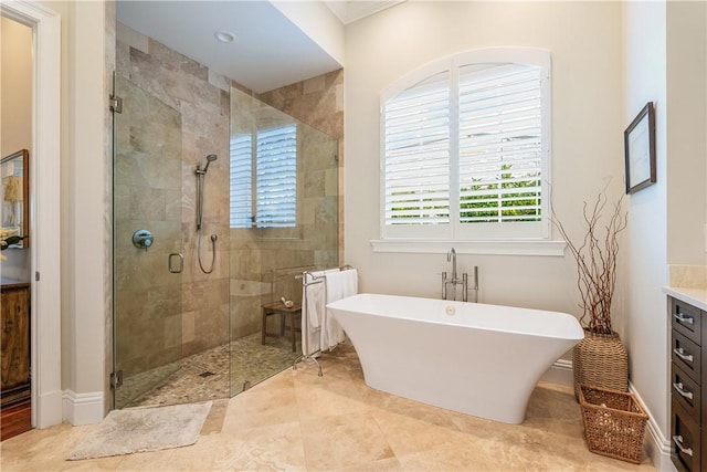 bathroom with radiator heating unit and independent shower and bath