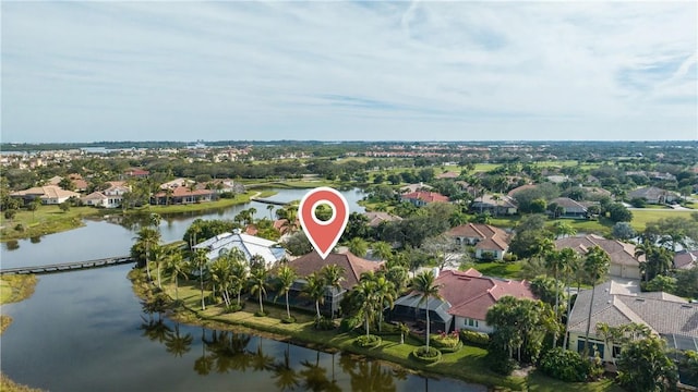 drone / aerial view featuring a water view