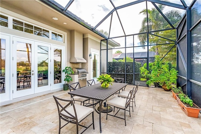 sunroom featuring french doors