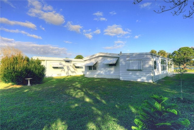 exterior space featuring a front yard