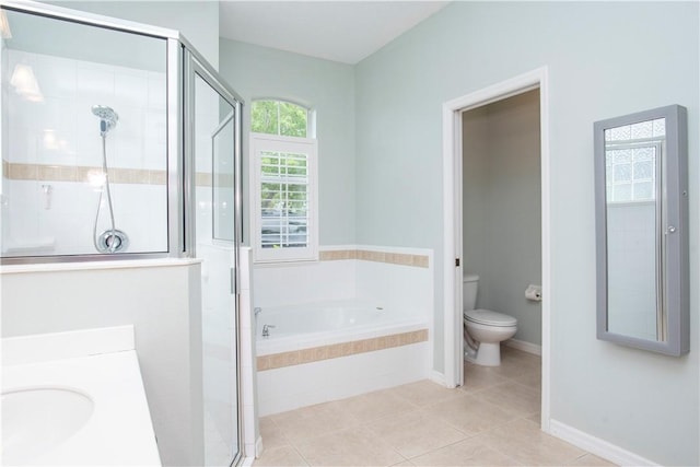500 45th Ct SW, Vero Beach, FL 32968 - bathroom featuring a garden tub, a shower stall, tile patterned floors, and vanity