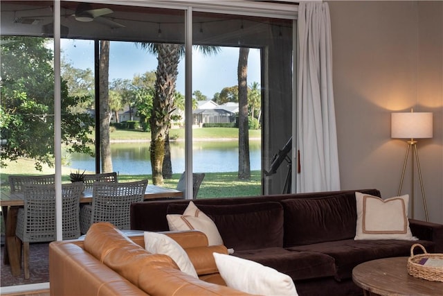 500 45th Ct SW, Vero Beach, FL 32968 - living room featuring ceiling fan and a water view