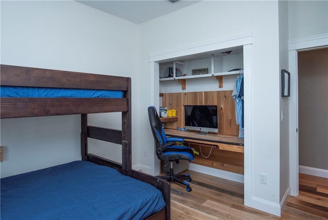 500 45th Ct SW, Vero Beach, FL 32968 - bedroom featuring wood finished floors and a desk