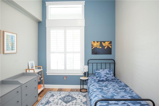 500 45th Ct SW, Vero Beach, FL 32968 - bedroom with wood finished floors and baseboards