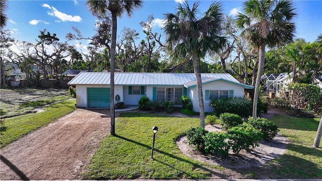 ranch-style home with a front lawn