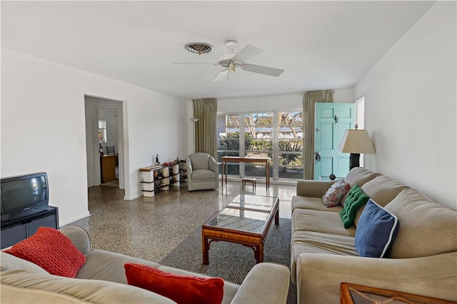 living room featuring ceiling fan