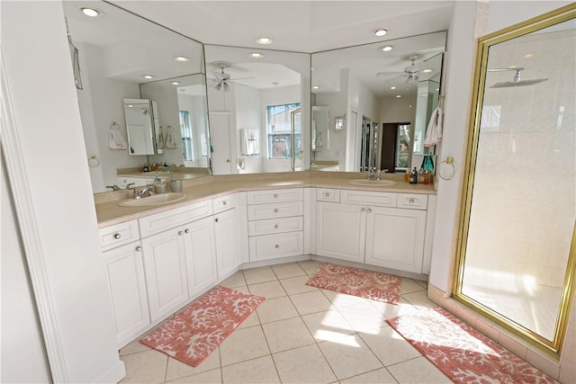 bathroom featuring vanity, tile patterned floors, ceiling fan, and walk in shower