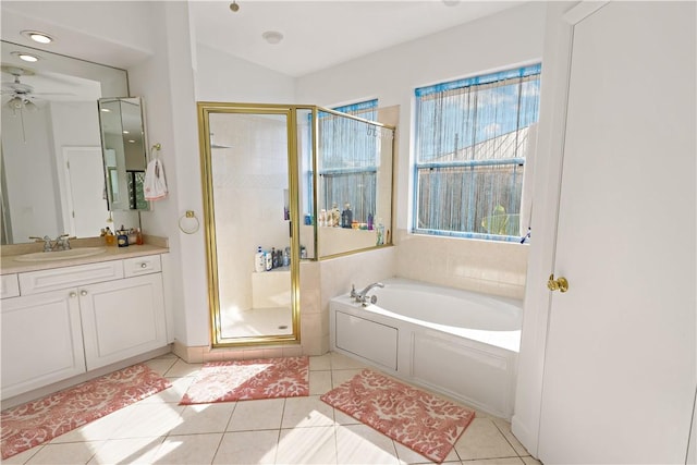 bathroom featuring vanity, tile patterned floors, plus walk in shower, and ceiling fan