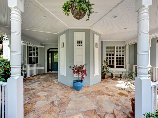 doorway to property with covered porch