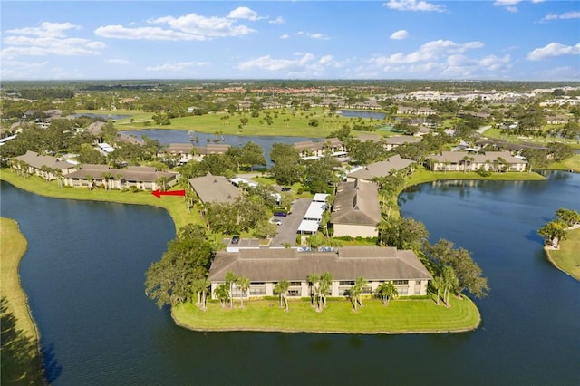 birds eye view of property featuring a water view and a residential view