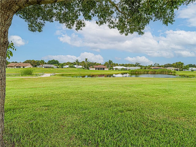 view of yard with a water view