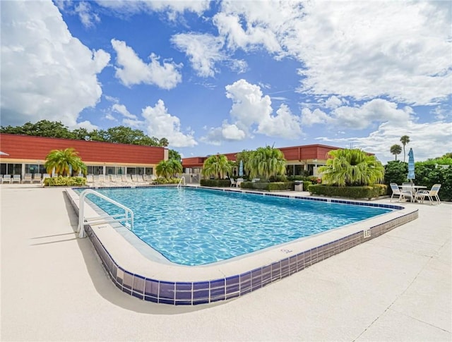 view of pool featuring a patio