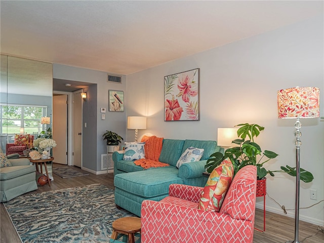 living room with hardwood / wood-style flooring