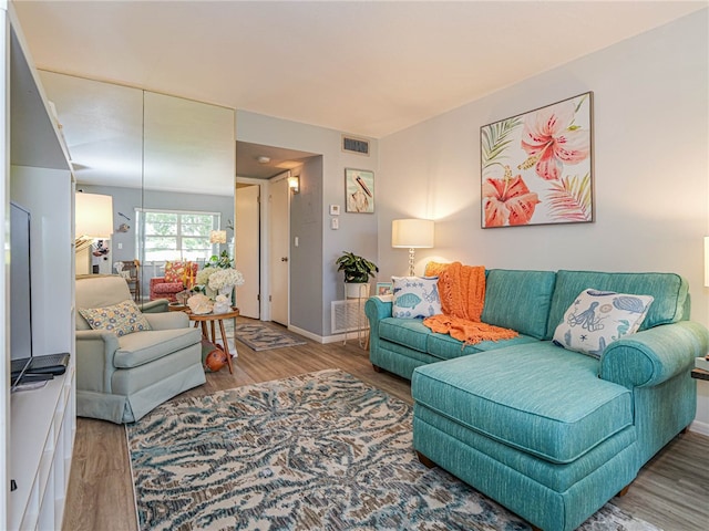 living room with wood-type flooring