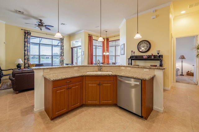 kitchen with crown molding, pendant lighting, light stone countertops, sink, and dishwasher