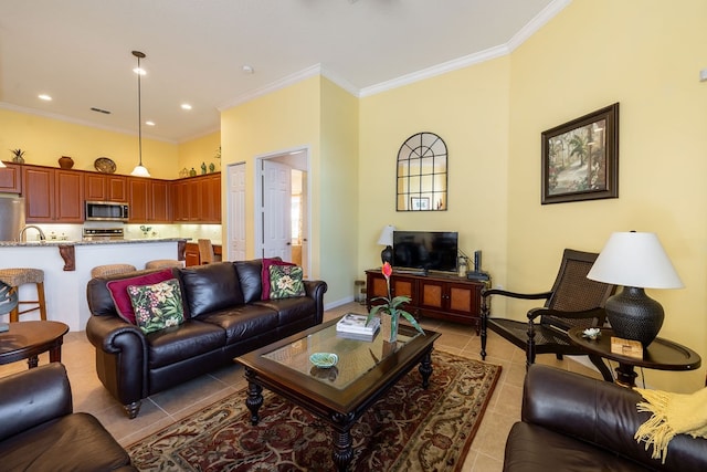 living room with light tile patterned floors and ornamental molding