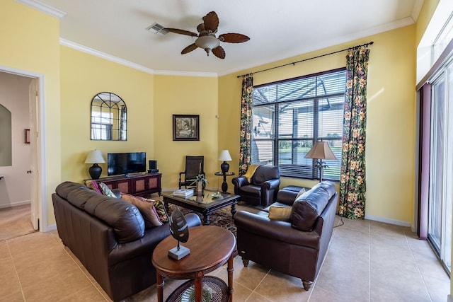 tiled living room featuring ceiling fan, plenty of natural light, and ornamental molding