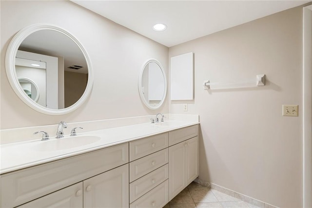 bathroom with vanity and tile patterned flooring