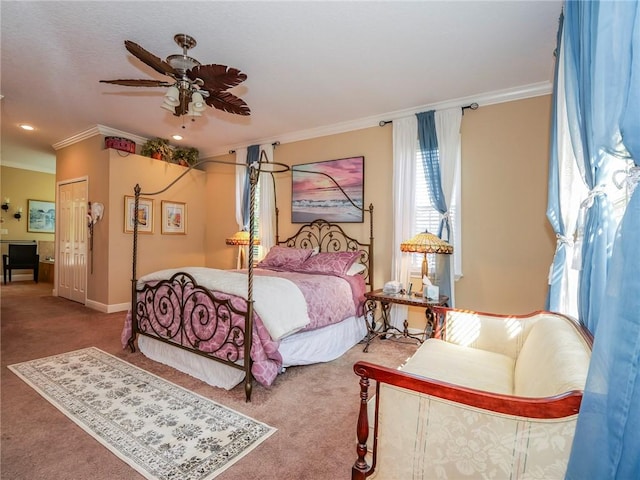 bedroom featuring baseboards, a ceiling fan, crown molding, and carpet