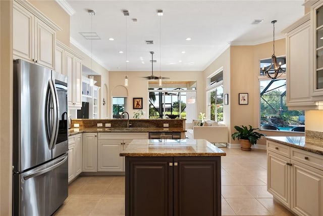 kitchen with light tile patterned floors, a peninsula, ornamental molding, a sink, and smart refrigerator