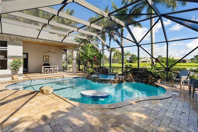 view of swimming pool with a lanai, a patio, ceiling fan, and a pool with connected hot tub