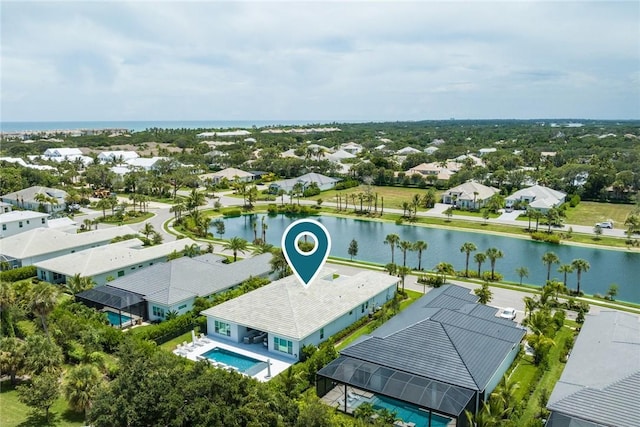 birds eye view of property featuring a water view