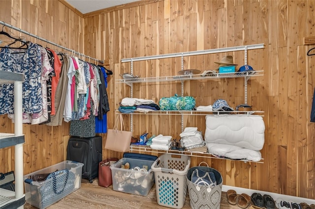 spacious closet featuring hardwood / wood-style floors