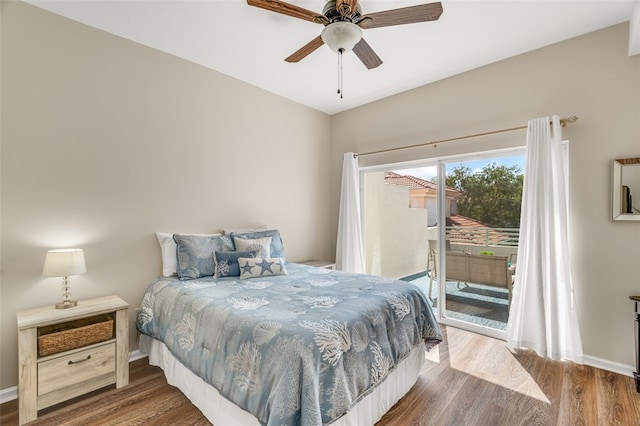 bedroom featuring hardwood / wood-style flooring, ceiling fan, and access to outside