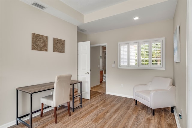 office area with light hardwood / wood-style flooring