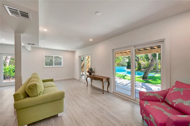 living room featuring light wood-type flooring