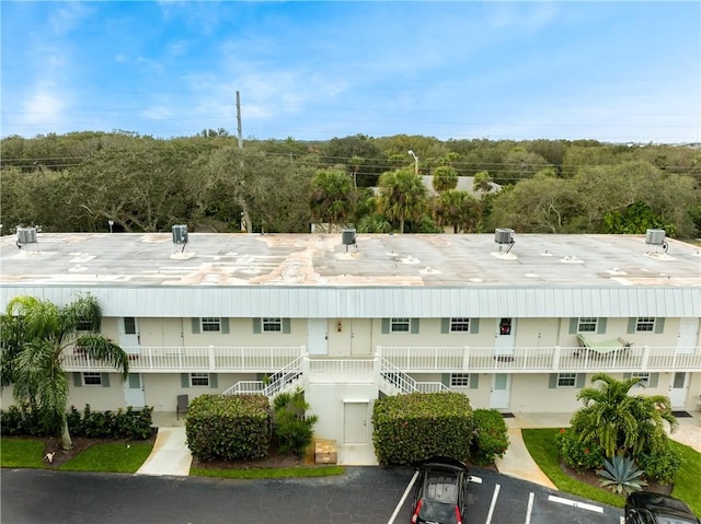 900 Jasmine Ln Unit 203A, Vero Beach, FL 32963 - view of building exterior with stairway