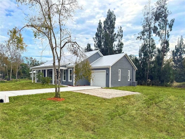 single story home with central air condition unit, a front lawn, and a garage