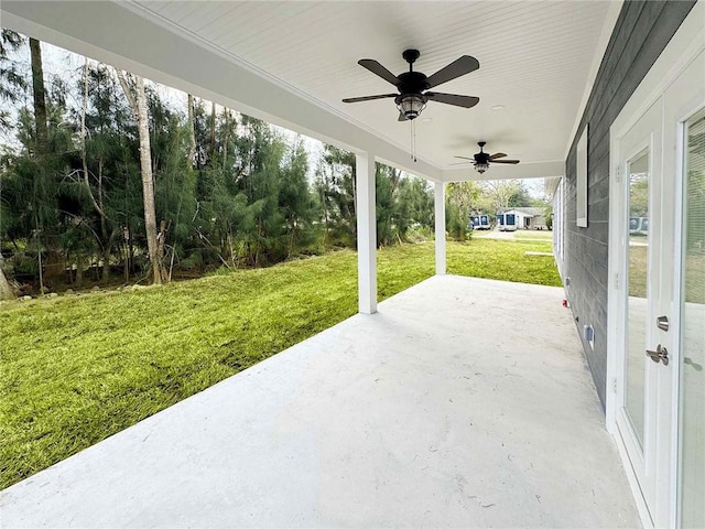 view of patio featuring ceiling fan