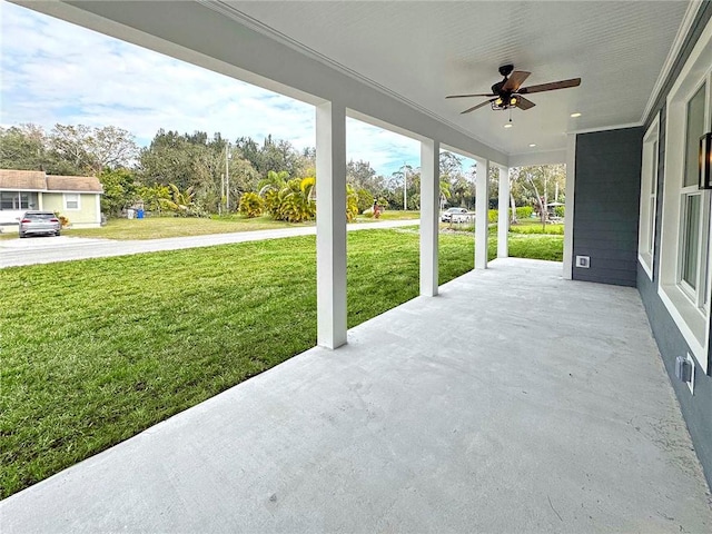 view of patio / terrace featuring ceiling fan